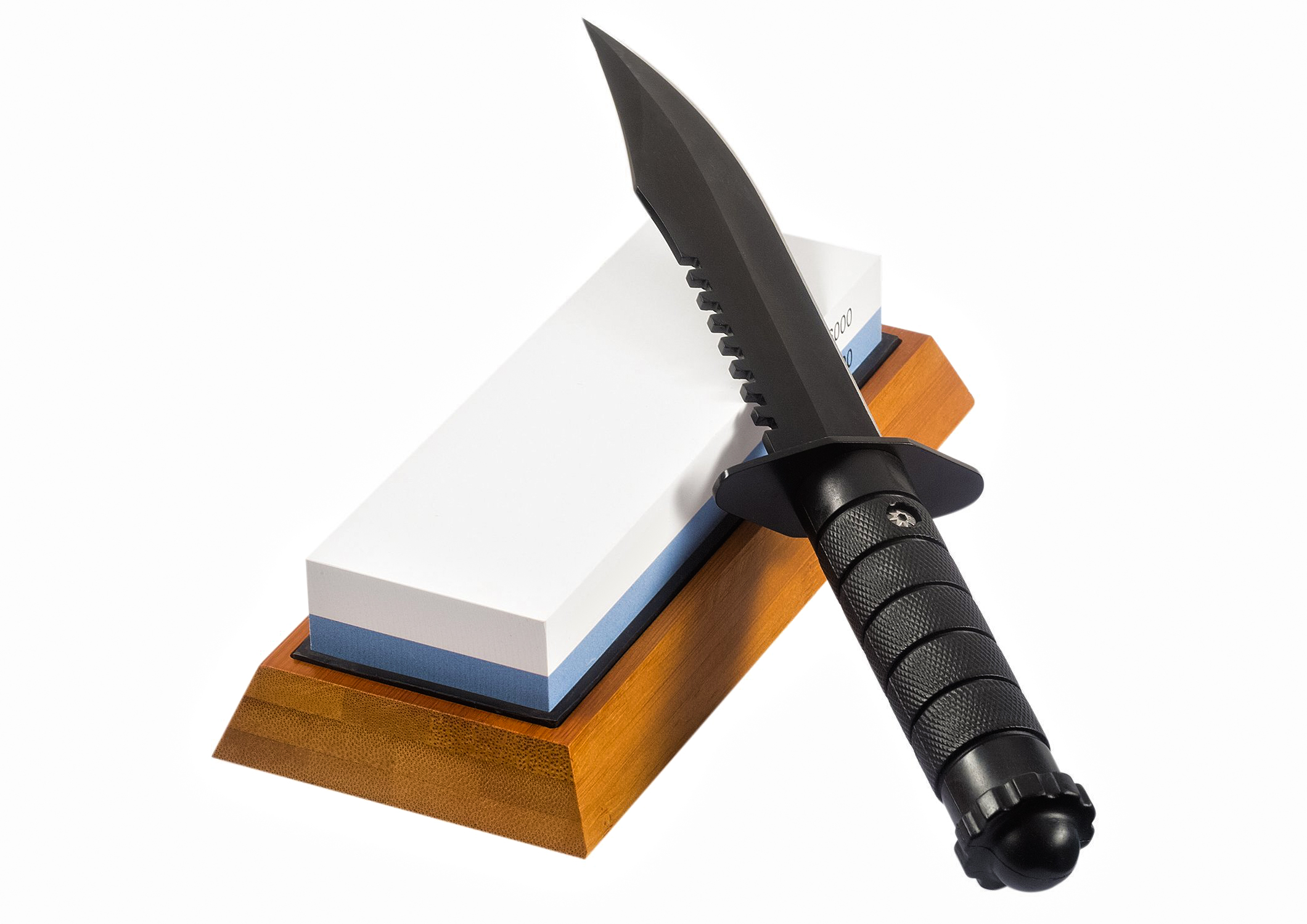 hunting knife and a whetstone to sharpen the knife