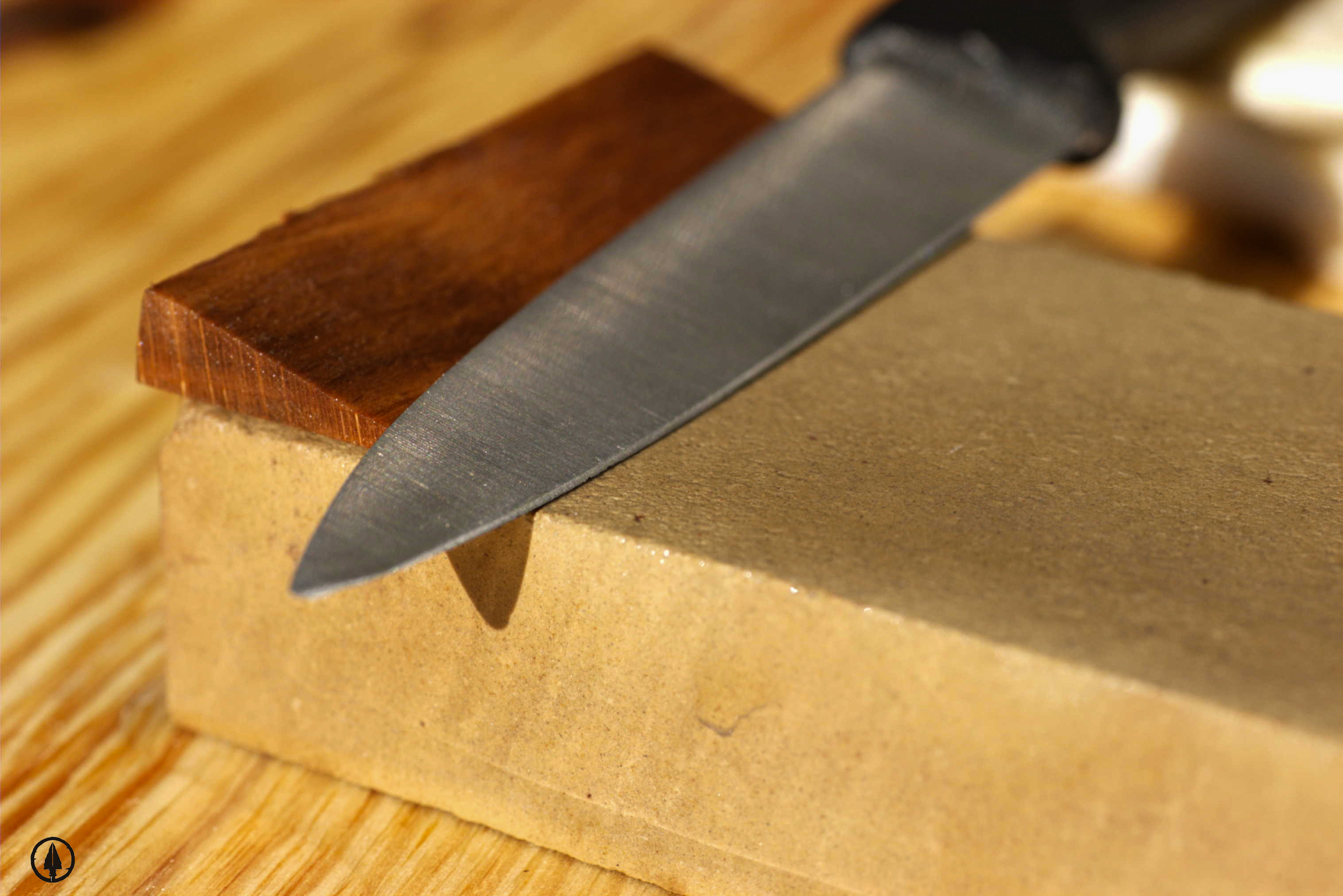 Sharpening a Hunting Knife on a Whetstone