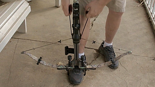 how to cock a crossbow using a rope cocking device