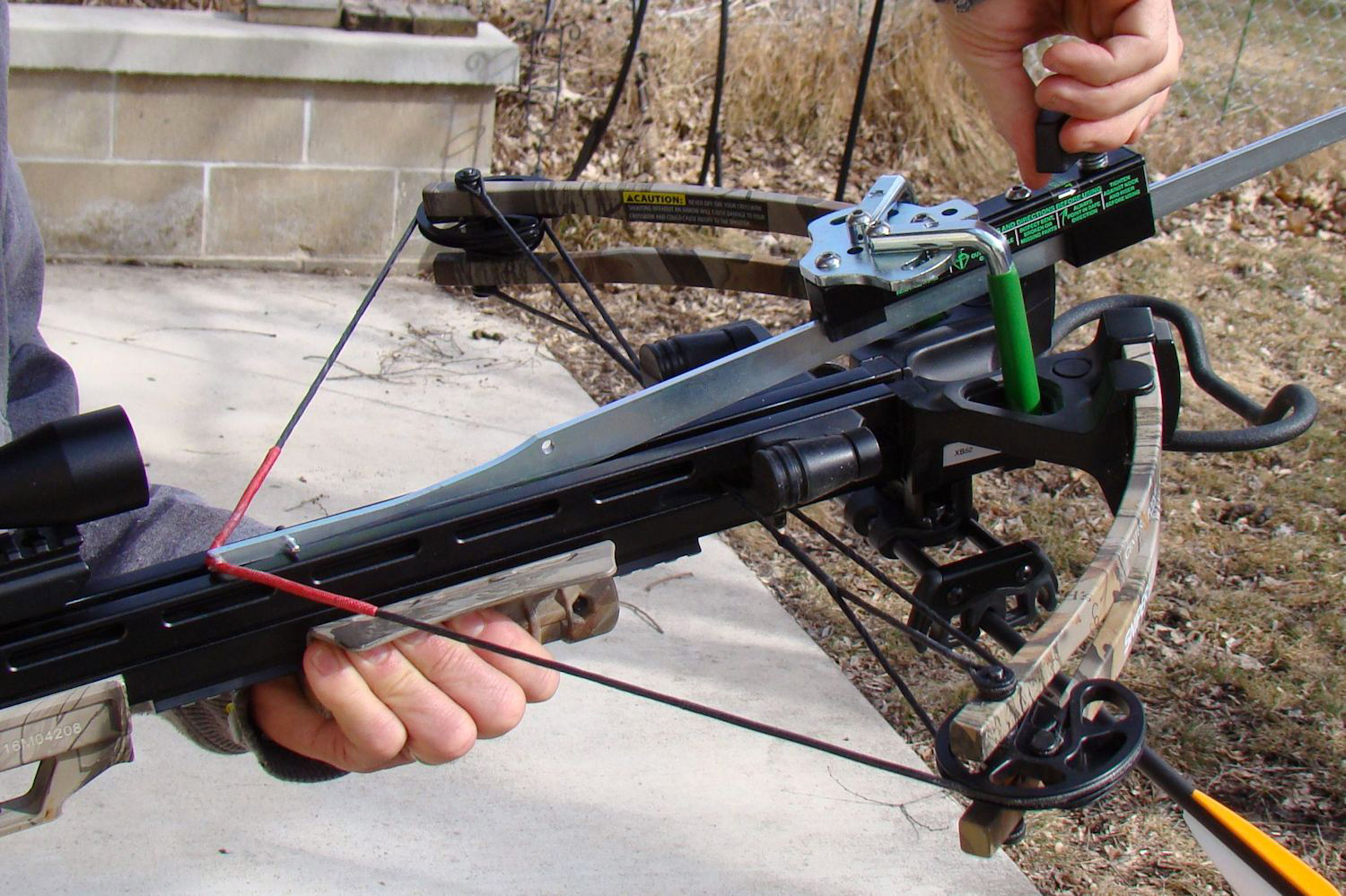 how to load crossbows with a bolt